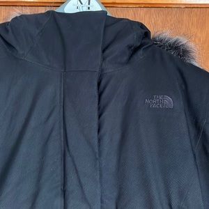 The North Face long black jacket for very cold whether Size L.